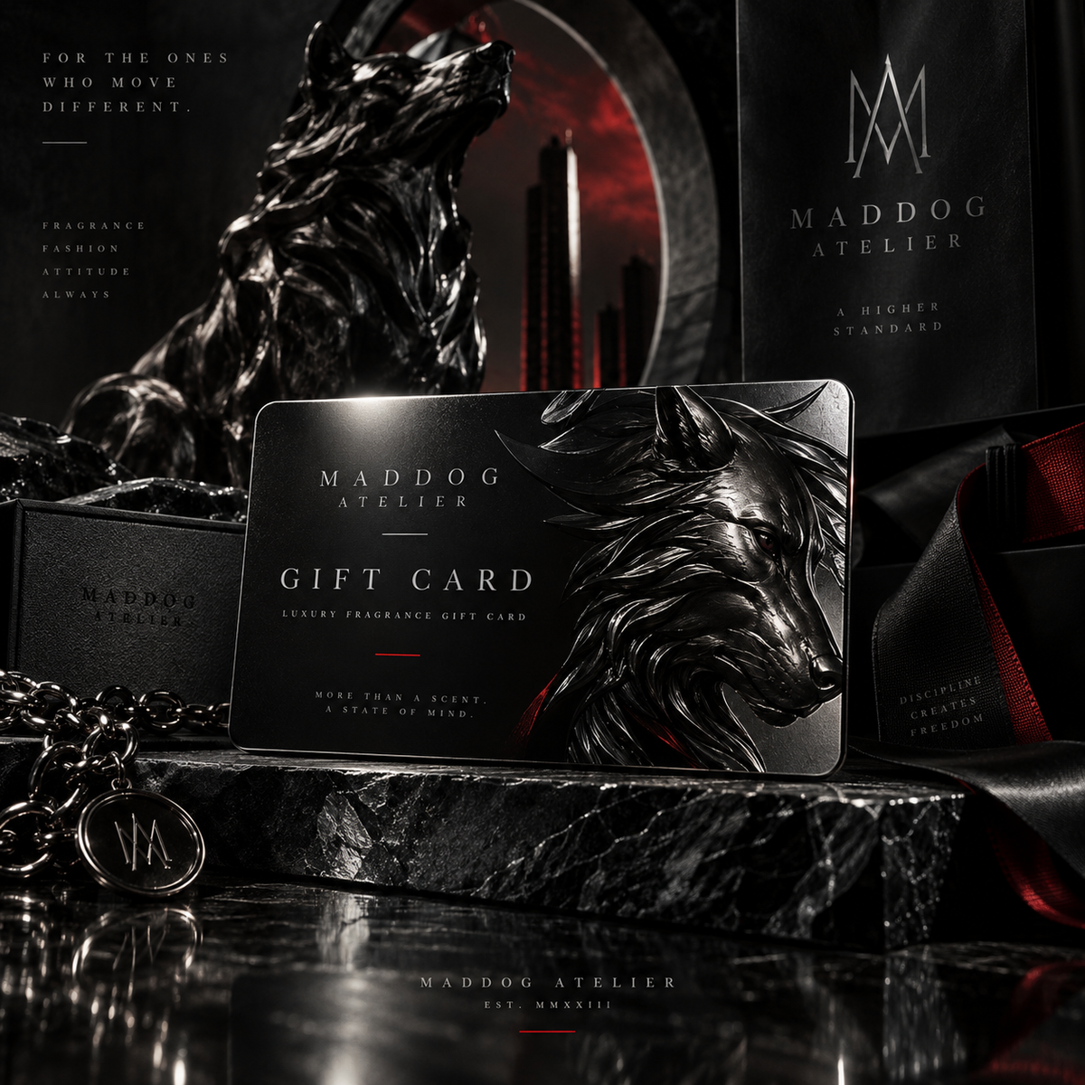 MADDOG GIFT CARD — a matte-black card catching a low crimson gleam.